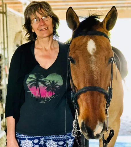 kathyzablotzky Me at a barn in Florida with a beautiful mare called Bo
